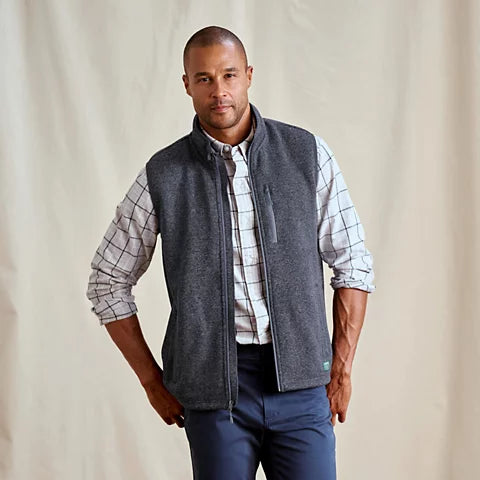 fleece vest over dress shirt Why Are All These Business Bros Wearing the Same Vest?