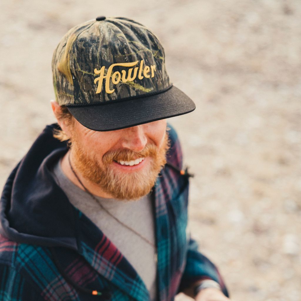 Howler Script Snapback Hat- Mossy Oak